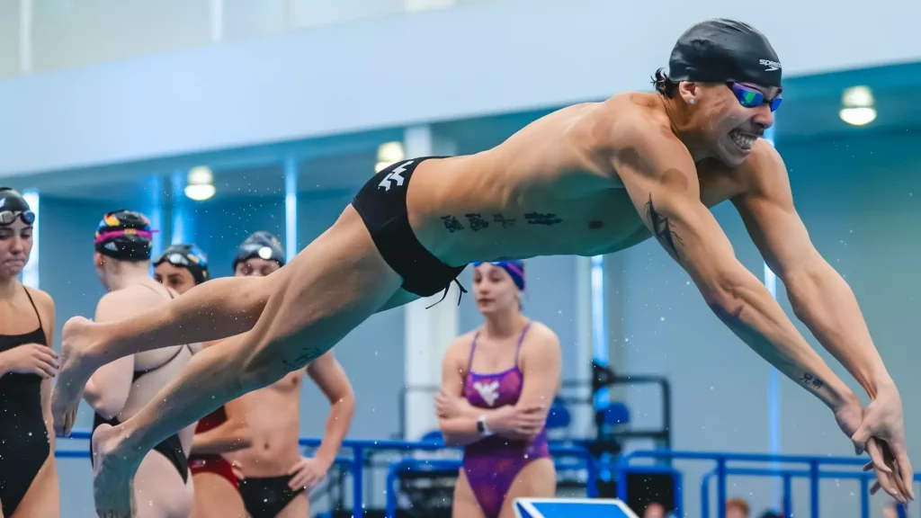 The current image has no alternative text. The file name is: WVU-swim-men.webp