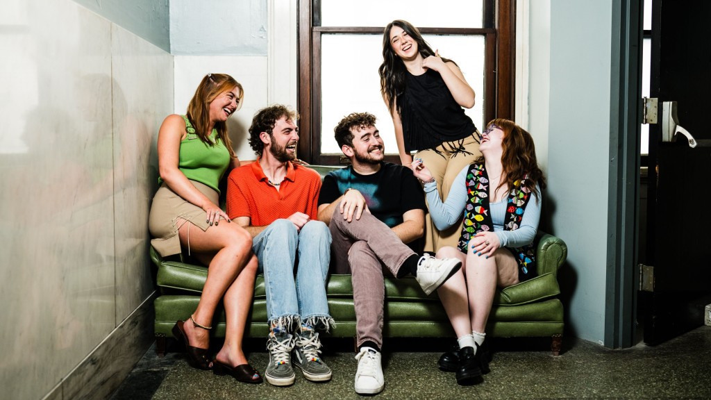 The current image has no alternative text. The file name is: ynst-team-couch-scaled.jpg